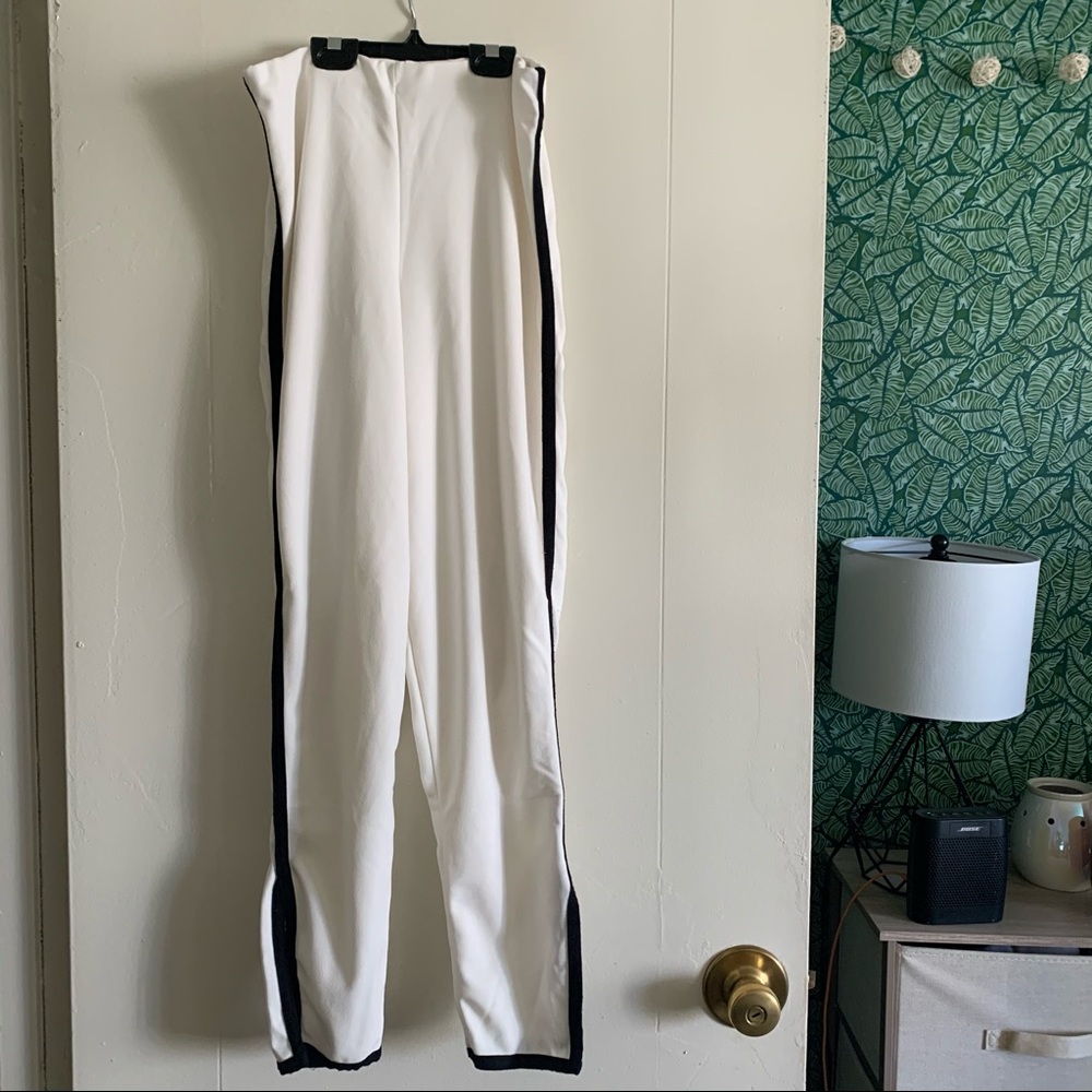 White pants with black trim